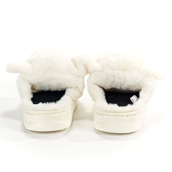 Back view of plush white bulldog slippers with black interior lining, thick EVA soles, and soft raised ears for cozy support.